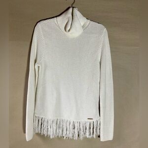 Michael Kors Turtleneck sweater. Fringe at the bottom. Size M.